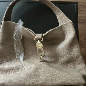 Dooney and Bourke Logo Lock Purse